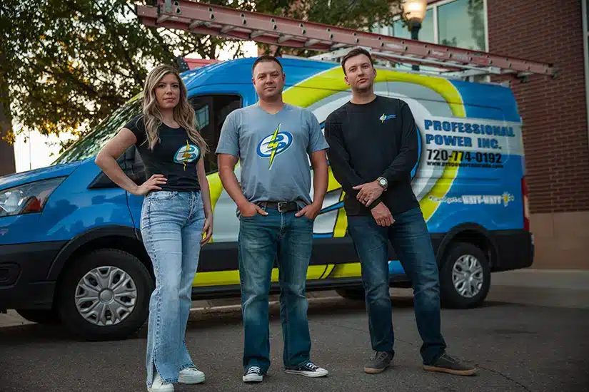Professional Power team in front of fleet truck in Westminster, CO.