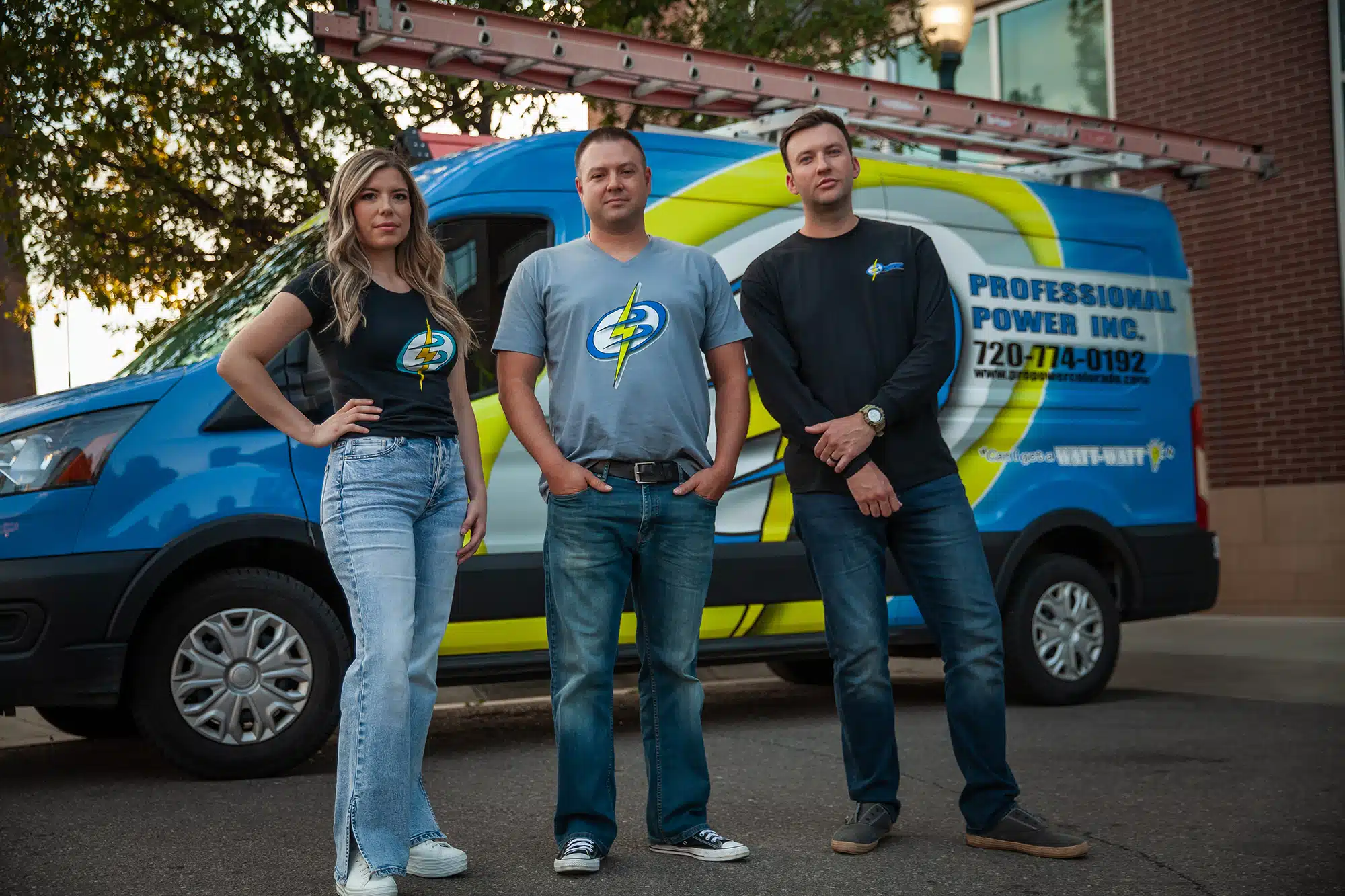 Professional Power electricians in Westminster standing in front of their truck.