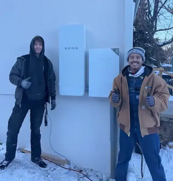 Techs in front of SPAN Smart Panel