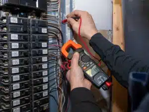 An electrician conducting a test.
